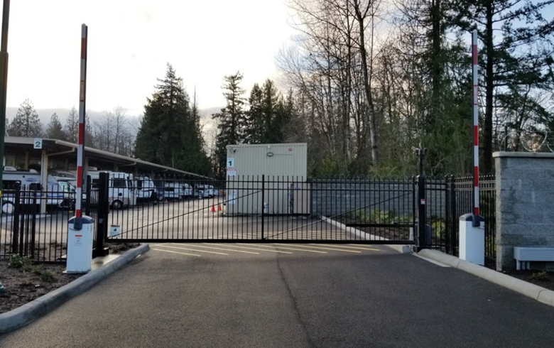 black commercial security gate that's electric and closed