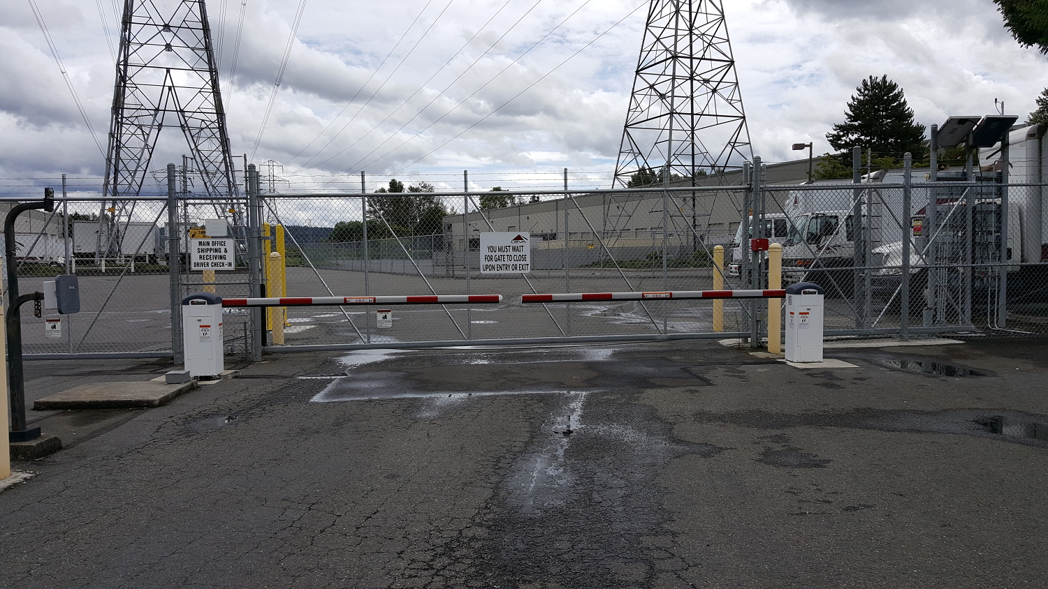 electric moving gate enclosing a commercial facility
